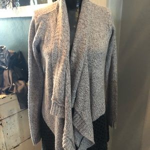 Grey and black sweaters